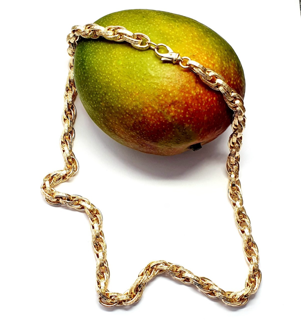 Detailed Gold Rope Chain Necklace, Elegant Design, Available in Various Lengths, pictured on a mango.