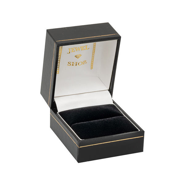 A black leatherette opened ring box with a thin gilt line around the top and the bottom part of the box were it opens and also a thin gilt border line around the very top of the box the inside where the ring goes is black velvet and the inside top lid is a white silk with jewel shop written in gold leaf