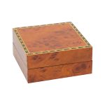 A beautiful, veneered wooden gift box pictured closed.