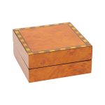 A beautiful, veneered wooden gift box pictured closed.