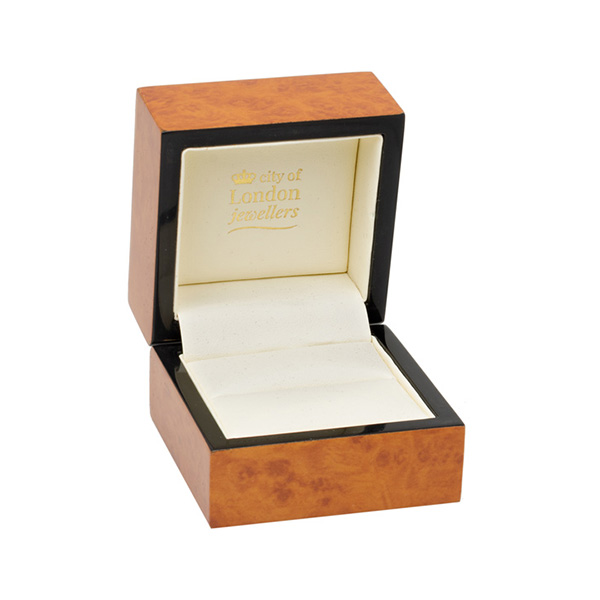 A beautiful, veneered wooden gift box pictured open.