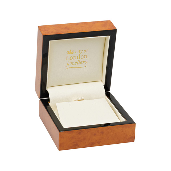 A beautiful, veneered wooden gift box pictured open.