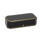 Chain link cufflink box black faux leather with black velvet pad and a white silk inner lid, pictured closed.