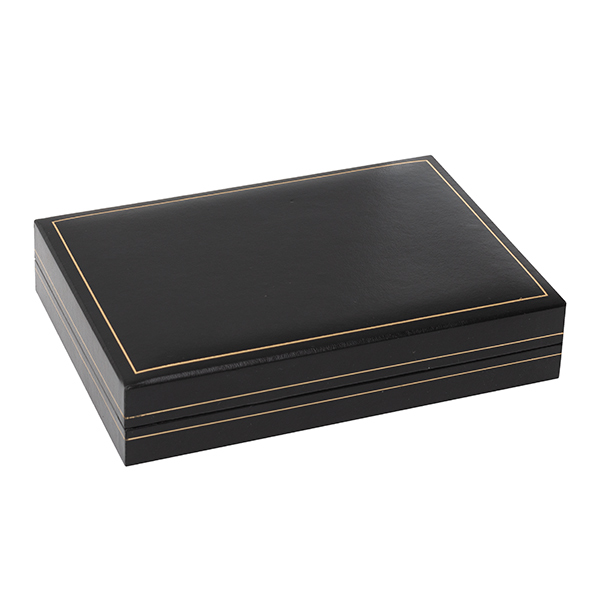 Black leatherette box with a black pad base and a white silk inner lid. Pictured closed.