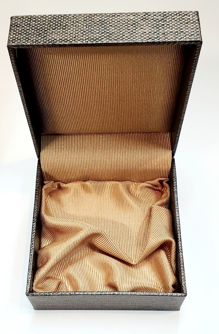 Inside of the Hoxton cufflink box showing light golden brown silk