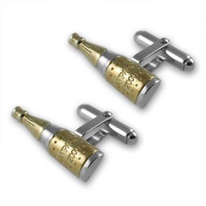 Sterling silver champagne bottle cufflinks with gold‑plated detail displayed on a clean white background, showing their polished finish and miniature design with crisp, high‑clarity lighting.