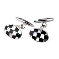Oval black and white chequered sterling silver chain‑link cufflinks displayed on a plain white background