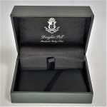 Douglas Pell money clip box showing front view open.