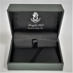 Douglas Pell money clip box showing front view open.
