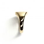 9ct Gold Cushion shaped Heavy signet ring with a Scroll pattern engraved in one corner and a single champagne colour Diamond in the other corner.