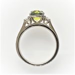 Side view showing the ring’s profile and elegant stone height.