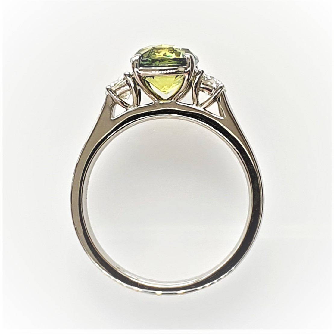 Side view showing the ring’s profile and elegant stone height.