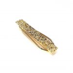 Artisan-crafted gold money clip with unique pattern