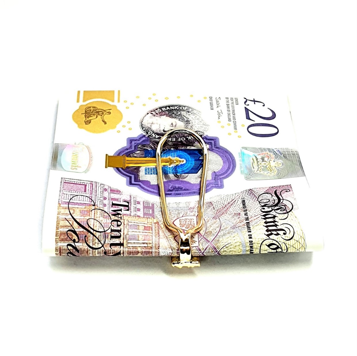 Gold clip for your cash with melted gold ,bar design displayed with a twenty pound note