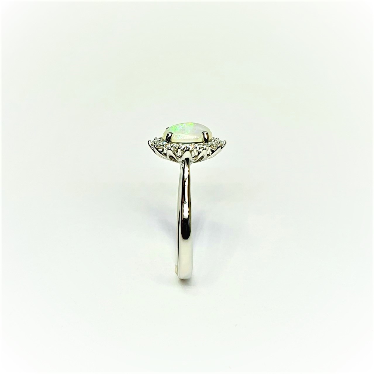 Platinum-Oval-Cluster-Ring-Set-With-One-Oval-Opal-&-Twelve-Round-Diamonds-RPT0181