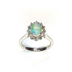 Platinum-Oval-Cluster-Ring-Set-With-One-Oval-Opal-&-Twelve-Round-Diamonds-RPT0181