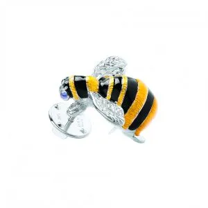 Sterling silver bumblebee brooch with kiln-fired enamel, handmade in Birmingham by Deakin & Francis—shown on a classic lapel for timeless British style.