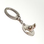 Genuine 925 silver key ring with the face of a Dachshund dog with blue sapphire eyes.