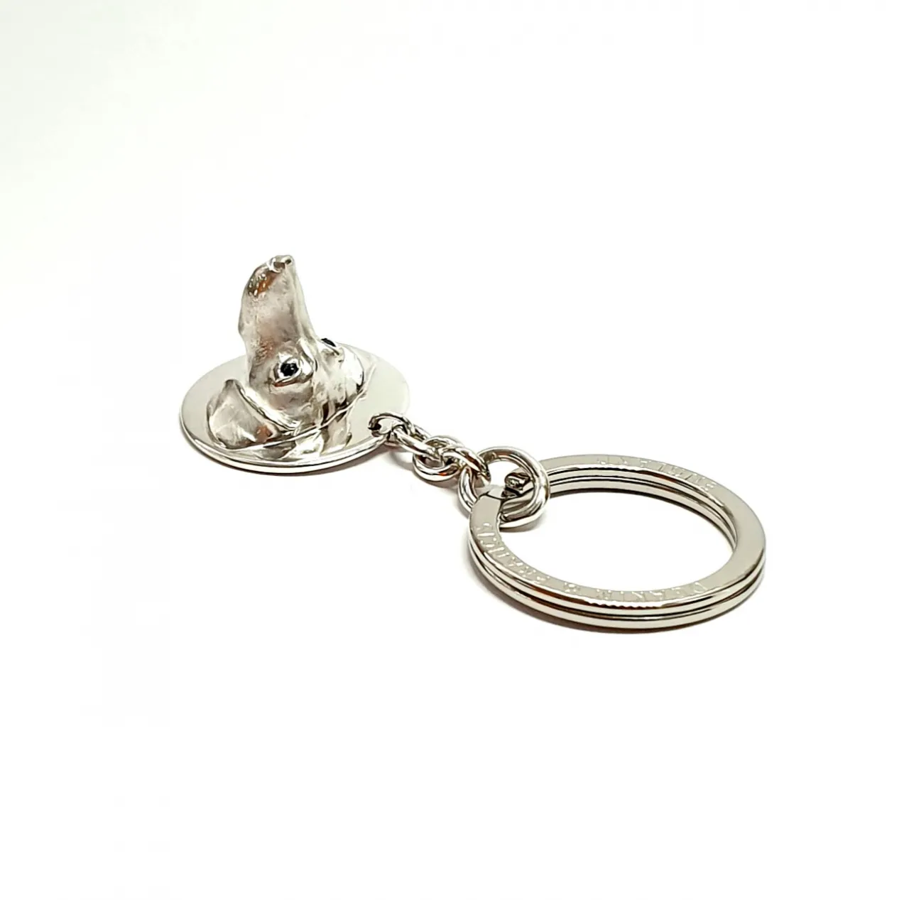 Genuine 925 silver key ring with the face of a Dachshund dog with blue sapphire eyes.