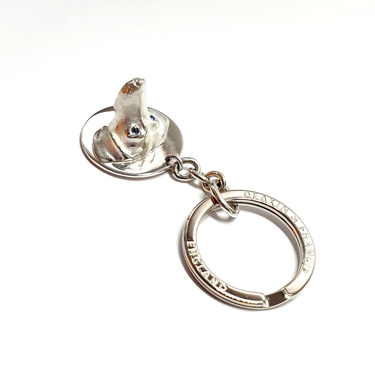 Genuine 925 silver key ring with the face of a Dachshund dog with blue sapphire eyes.