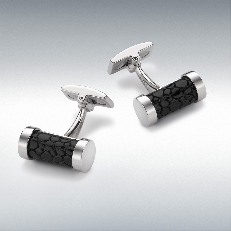 "Exquisite craftsmanship: Shagreen embossed black leather and sterling silver cylindrical cufflinks, a sophisticated accessory for the modern gentleman."