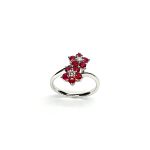 Ruby Double Cluster Ring with claw settings crafted in 18ct white gold featuring two clusters of five round bright red rubies with a single diamond centre to each cluster