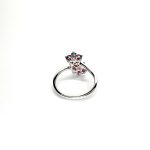 Ruby Double Cluster Ring with claw settings crafted in 18ct white gold featuring two clusters of five round bright red rubies with a single diamond centre to each cluster