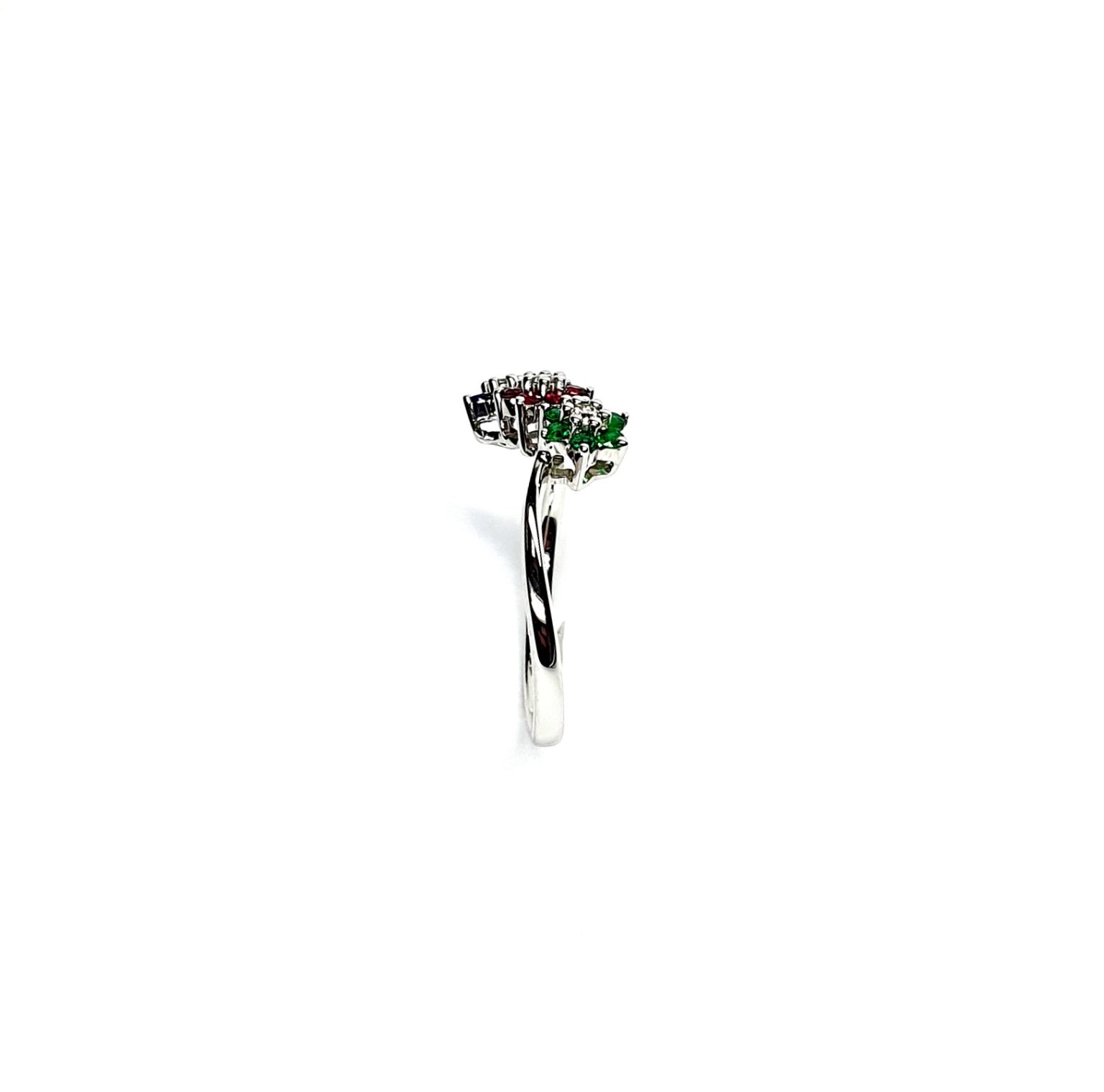 "18ct White Gold Sapphire, Ruby, Emerald & Diamond Three-Cluster Ring: Mesmerizing beauty with vibrant gemstones, exquisite craftsmanship, elegant crossover wave shank, and unmatched quality."