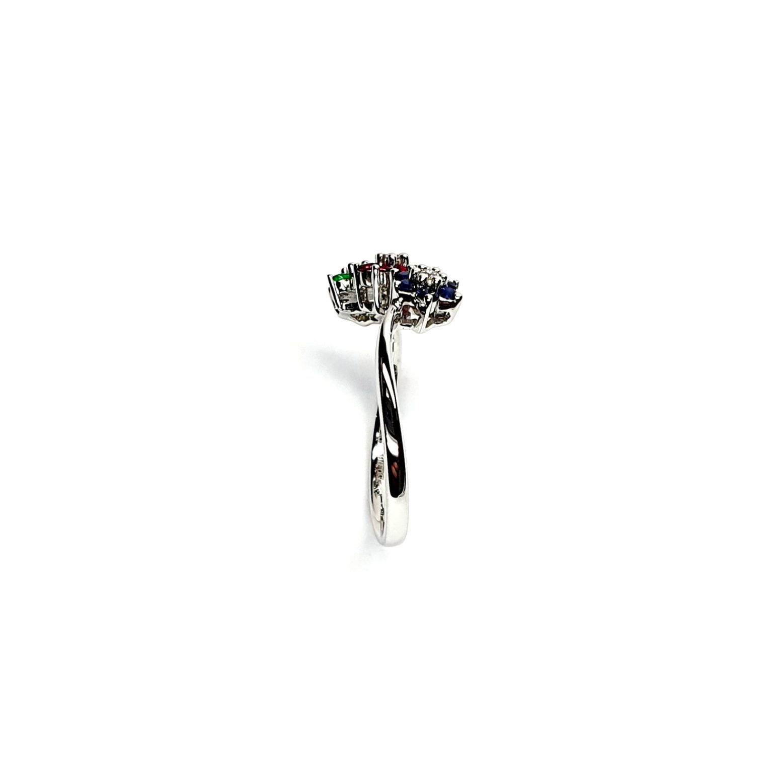 "18ct White Gold Sapphire, Ruby, Emerald & Diamond Three-Cluster Ring: Mesmerizing beauty with vibrant gemstones, exquisite craftsmanship, elegant crossover wave shank, and unmatched quality."
