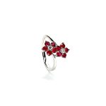 Ruby Double Cluster Ring with claw settings crafted in 18ct white gold featuring two clusters of five round bright red rubies with a single diamond centre to each cluster