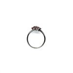 Ruby Double Cluster Ring with claw settings crafted in 18ct white gold featuring two clusters of five round bright red rubies with a single diamond centre to each cluster