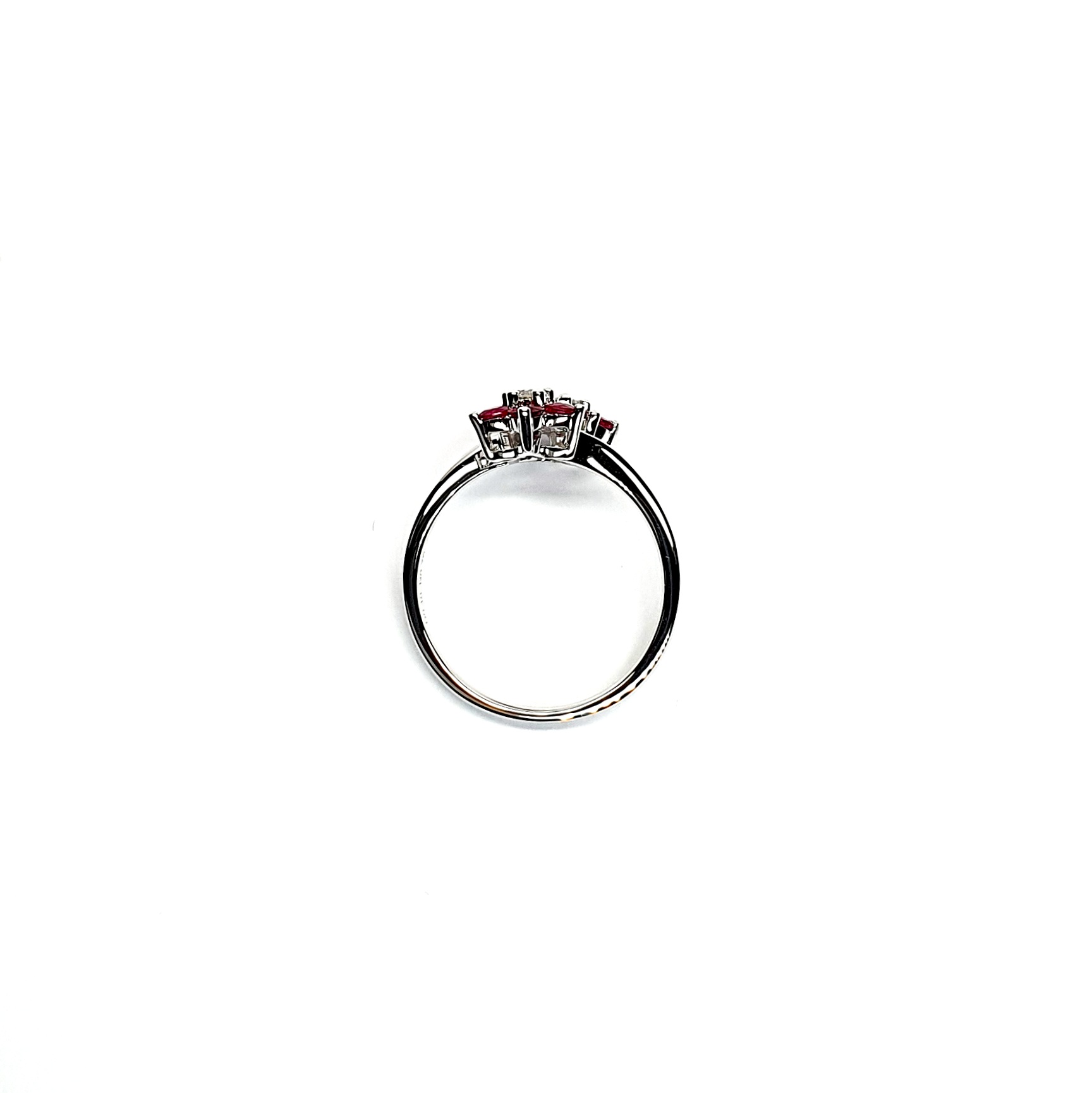 Ruby Double Cluster Ring with claw settings crafted in 18ct white gold featuring two clusters of five round bright red rubies with a single diamond centre to each cluster