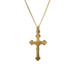 The Staveley 9ct Crucifix Necklace is 32mm with the top saddle loop 25mm x 16.8mm without and is 2mm in depth. It is made with a hollow 9ct yellow gold tube with a white gold Jesus, all highly polished. It can be purchased independently or with a 16, 18 or 20-inch traditional solid gold curb link chain.