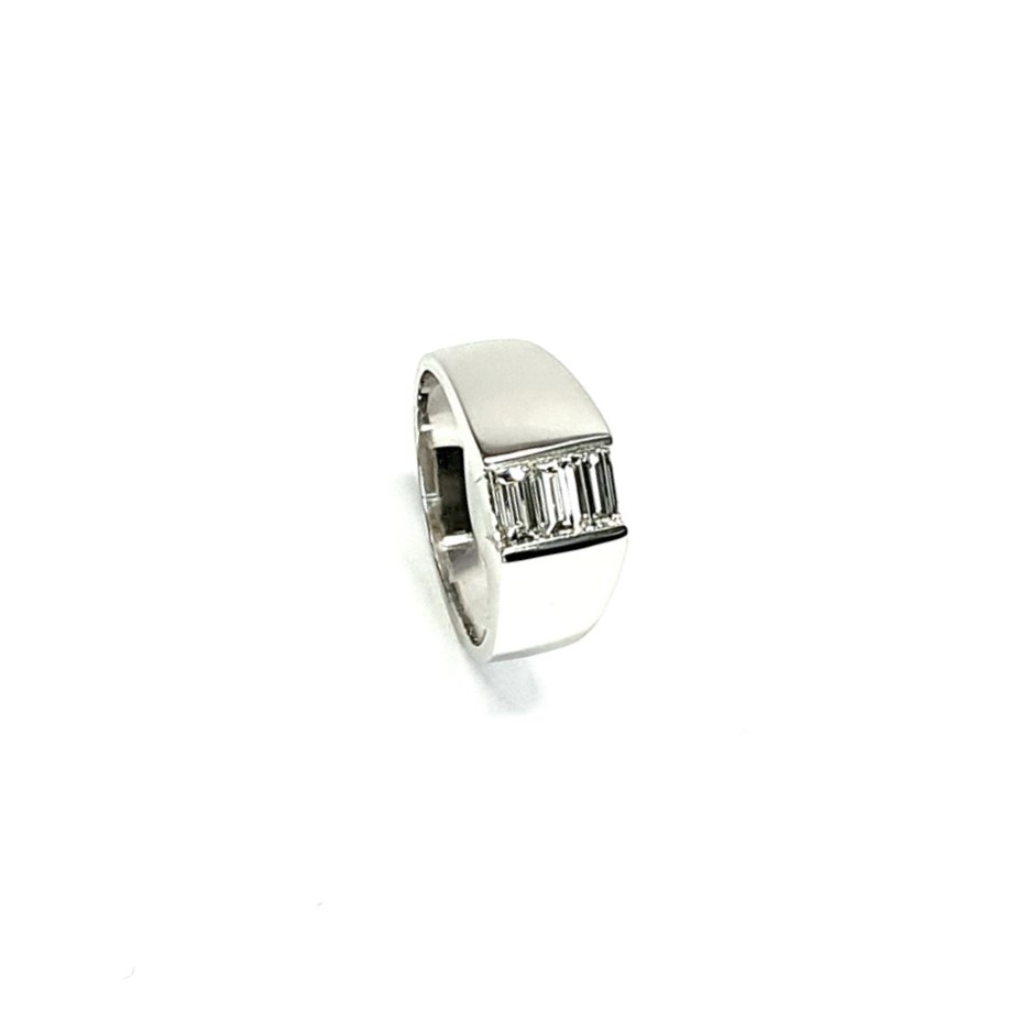 950 Platinum signet style ring set with three baguette diamonds in a landscape rub-over setting, showing at a 45% angle
