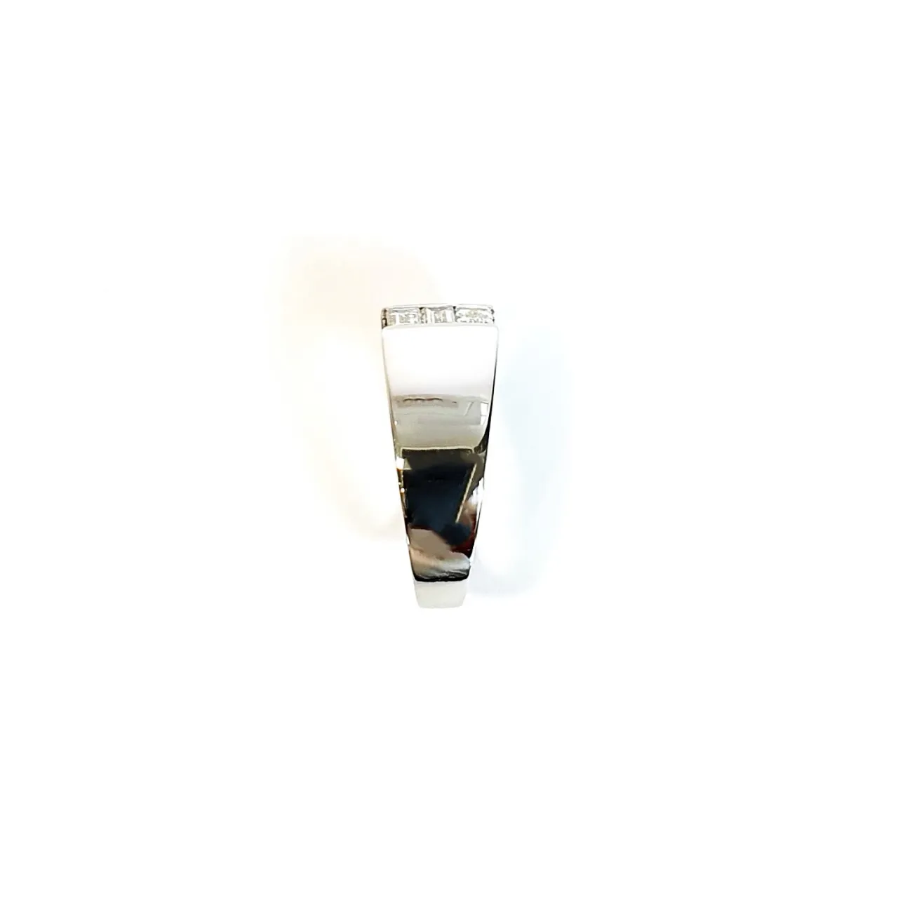 950 Platinum signet style ring set with three baguette diamonds in a landscape rub-over setting, showing from the shoulder side showing a slight view of the diamonds