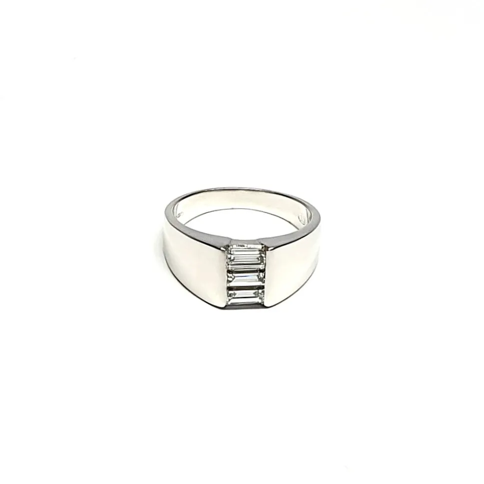 950 Platinum signet style ring set with three baguette diamonds in a landscape rub-over setting, showing at a slight angle to the top laying down flat