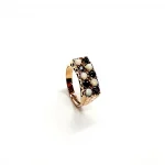 Vintage 1979 opal & dark blue sapphire 9ct gold landscape rectangular top ring measuring 18mm x 7.8mm set with five round cabochon cut opals & five round dark blue sapphires in a chequer formation with three hand engraved flowers to both—side shoulders.