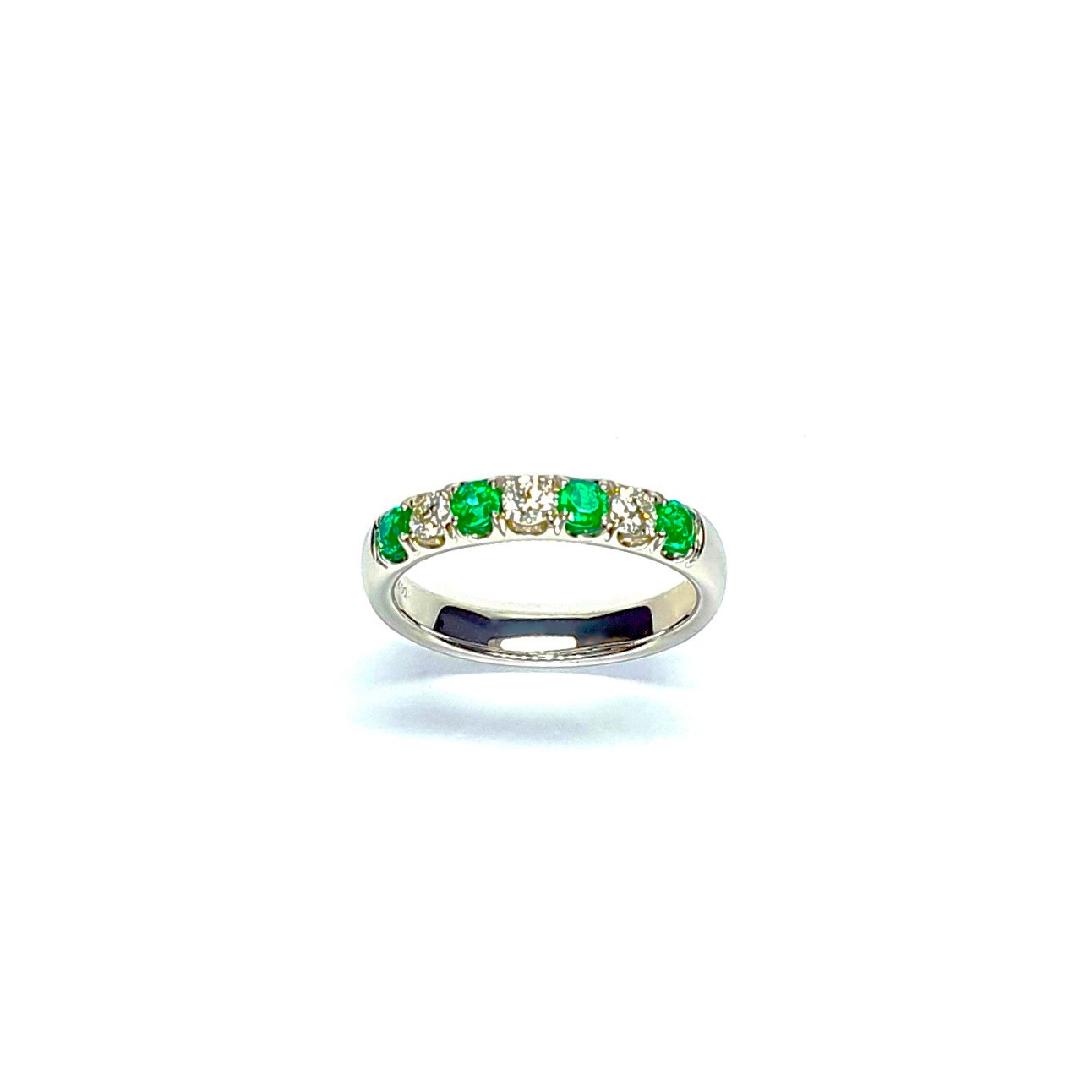18ct White Gold Emerald & Diamond Eternity Ring RA00685 Four 2.8mm round emeralds and three 2.8mm round diamonds ring standing up to the front angled facing to the front.