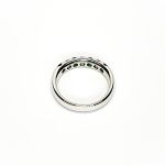 18ct White Gold Emerald & Diamond Eternity Ring RA00685 Four 2.8mm round emeralds and three 2.8mm round diamonds ring laying down view of the back.