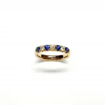 18ct Yellow Gold Emerald & Diamond Eternity Ring RA00686 Four 2.8mm round sapphires and three 2.8mm round diamonds ring standing up to the front angled facing to the front.