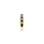18ct Yellow Gold Sapphires & Diamond Eternity Ring RA00686 Four 2.8mm round sapphires and three 2.8mm round diamonds ring standing up side shoulder view.