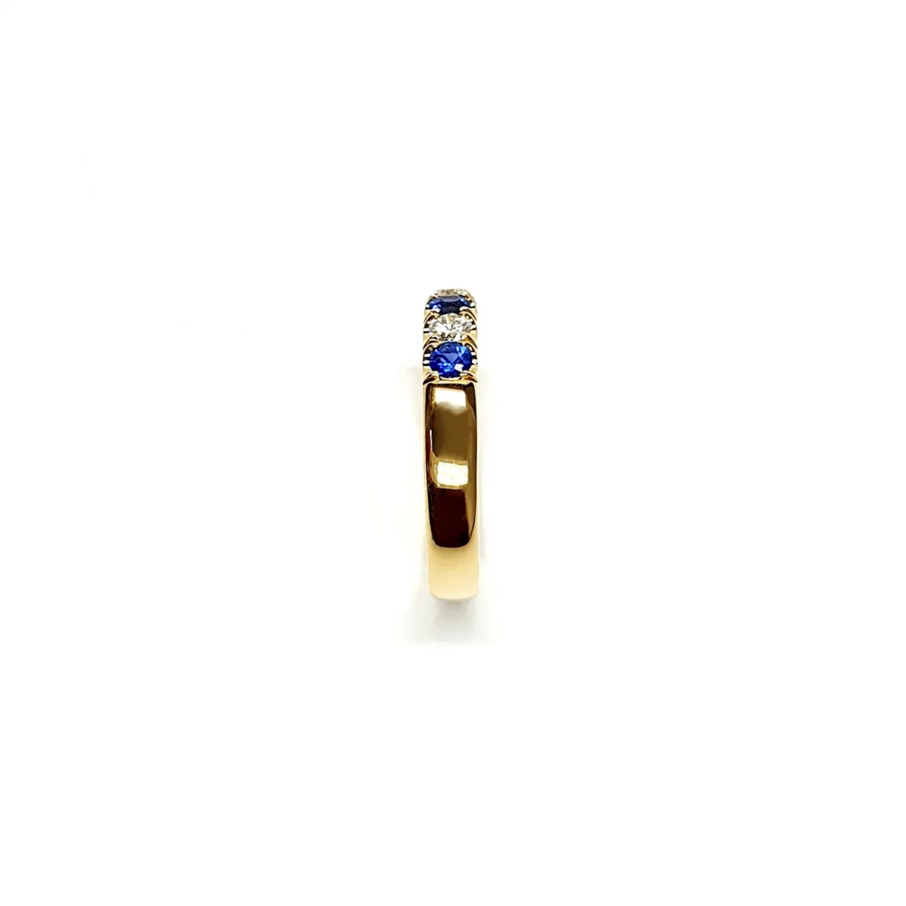 18ct Yellow Gold Sapphires & Diamond Eternity Ring RA00686 Four 2.8mm round sapphires and three 2.8mm round diamonds ring standing up side shoulder view.