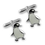 Sterling Silver Penguin Cufflinks with a black enamelled head and white enamelled body; the feet and flippers are polished silver, and they have swivel torpedo backs