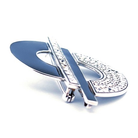 Sterling Silver Art Deco Brooch with two central off-set bars, one with square crystals and the other with black enamel with a half-circle on each side, one with white crystals and the other with black enamel, so you have a white crystal half-circle onto a black line then a white line and then a black circle. Side edge view.