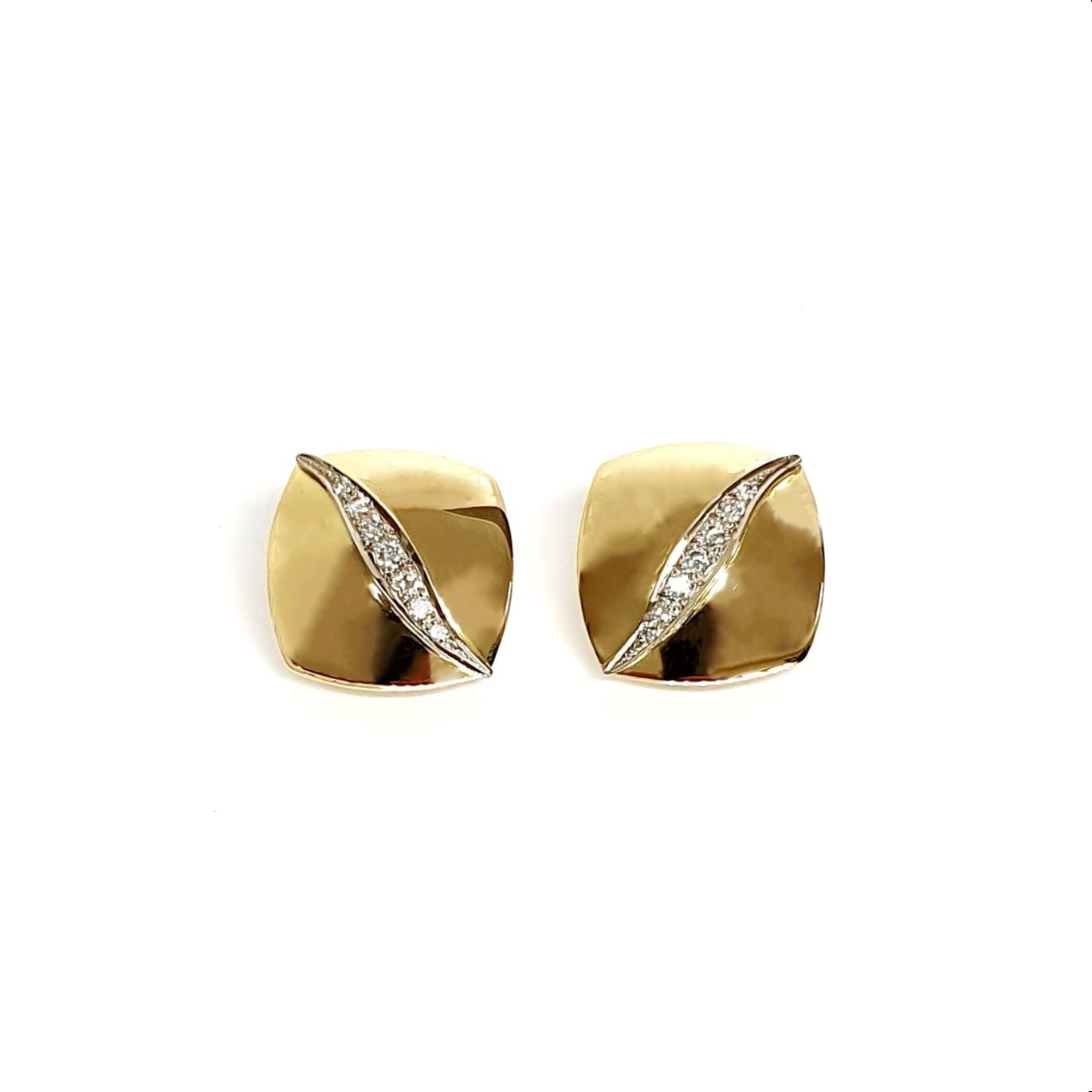 Measurements 16mm x 16mm. And 19mm corner to corner Handmade 18ct yellow gold curved cushion-shaped clip-on earrings with an 18ct white gold wave going from corner to corner set with seven graduated round white diamonds to each earring.
