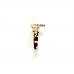 A 9ct rose gold Claddagh ring (Irish fáinne Chladaigh) is a traditional Irish ring in which a heart represents love, the crown stands for loyalty, and two clasped hands symbolize friendship.