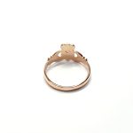 A 9ct rose gold Claddagh ring (Irish fáinne Chladaigh) is a traditional Irish ring in which a heart represents love, the crown stands for loyalty, and two clasped hands symbolize friendship.