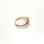 A 9ct rose gold Claddagh ring (Irish fáinne Chladaigh) is a traditional Irish ring in which a heart represents love, the crown stands for loyalty, and two clasped hands symbolize friendship.