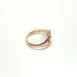 A 9ct rose gold Claddagh ring (Irish fáinne Chladaigh) is a traditional Irish ring in which a heart represents love, the crown stands for loyalty, and two clasped hands symbolize friendship.