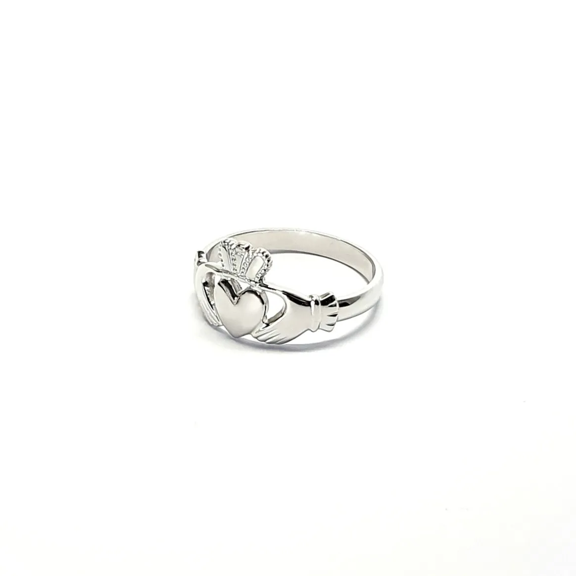 A 9ct white gold Claddagh ring (Irish fáinne Chladaigh) is a traditional Irish ring in which a heart represents love, the crown stands for loyalty, and two clasped hands symbolize friendship.